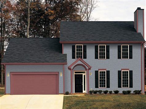 gray house with metal roof|gray house with dark trim.